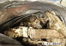 Polish plane crash remains tested for presence of explosives - three collection papers used to wipe out the bottom of the container with a safety belt extract indicated a stain consistent with 2, 4, 6-trinitrotoulene (T.N.T.). The test has been repeated after 24 hours and papers photographed. 